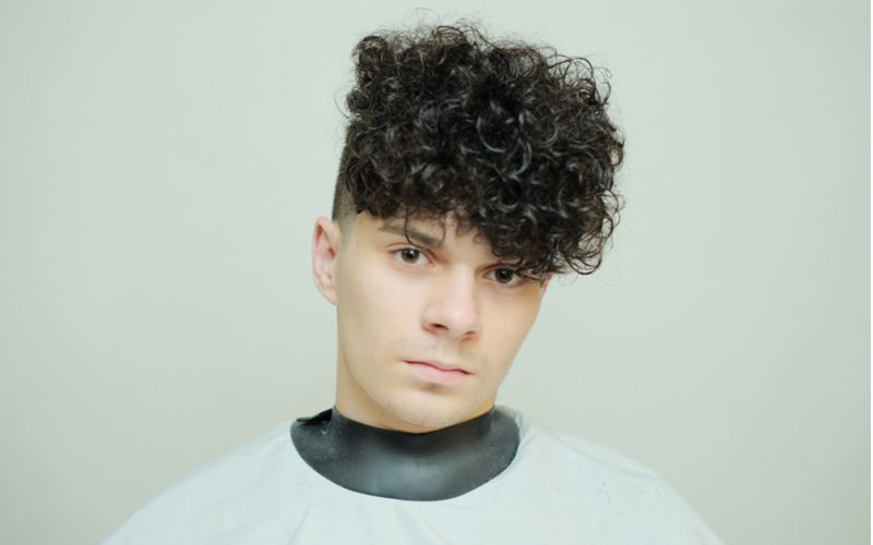 Fade With Tight Permed Men's Quiff Hairstyle