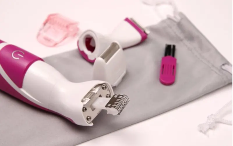 White and pink bikini trimmer with attachments