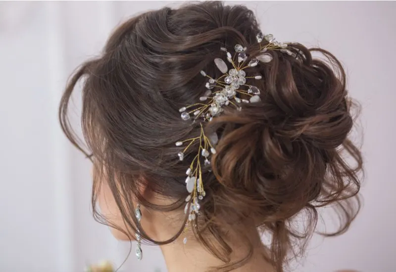Messy Middle Wedding Bun for a piece titled curly hair bun