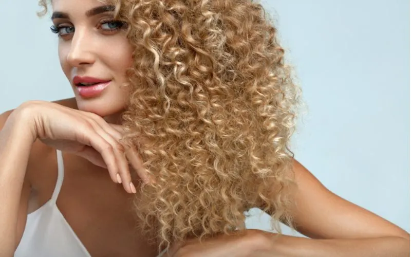 Gorgeous woman who just got a popular type of perm in a hair salon