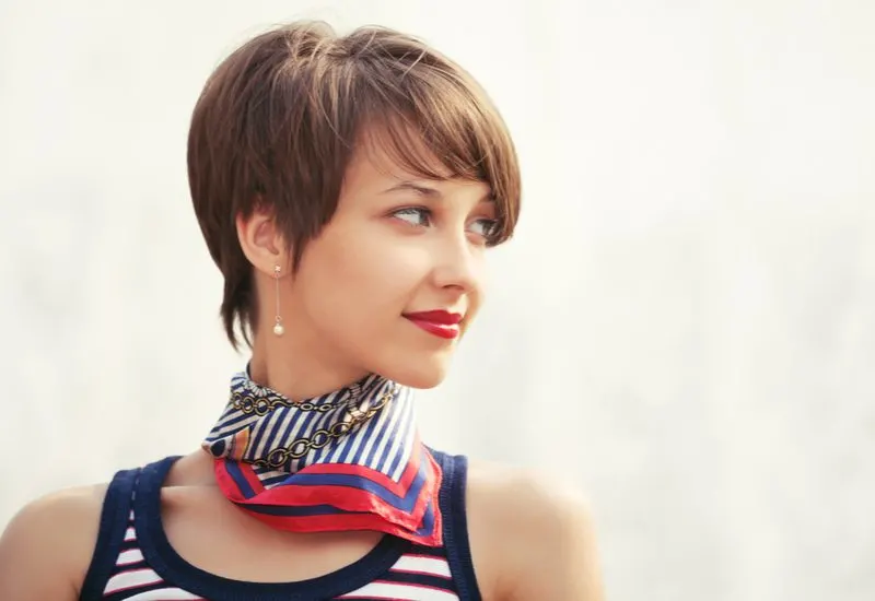 For a piece on hairstyles for growing out a pixie, a Soft Layer cut on a woman