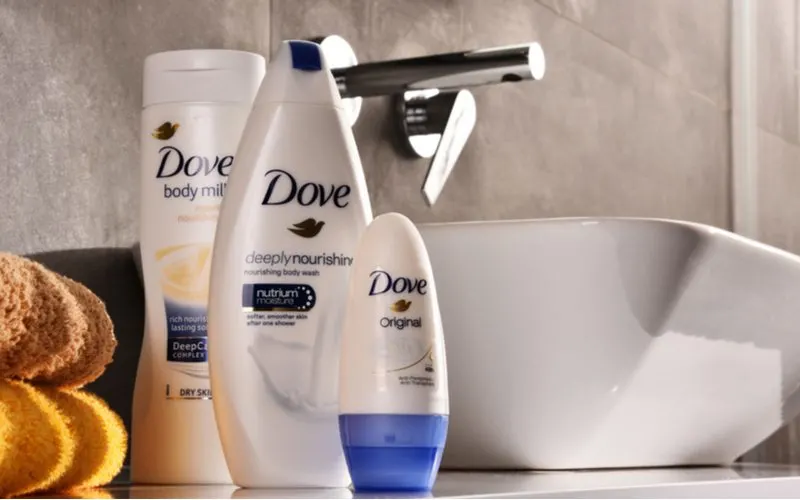 For a piece on Is Dove Shampoo Good, a few types of the product sit on the counter