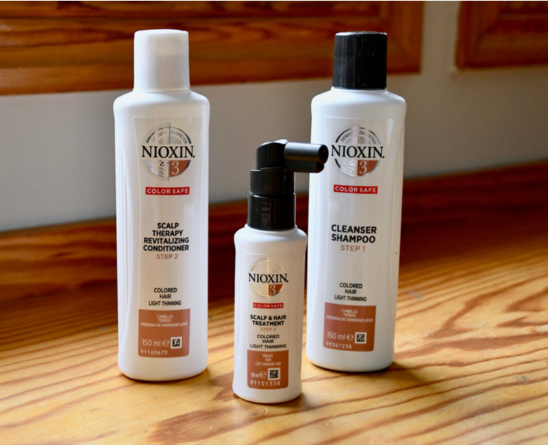 Image titled what is nioxin shammpoo showing 3 bottles on a table