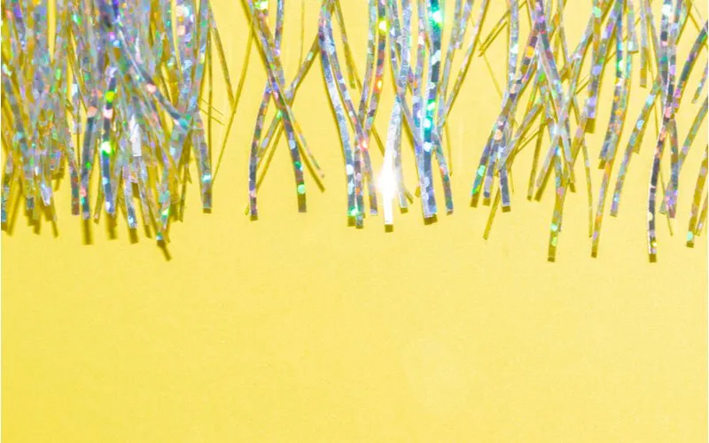 Hair tinsel lying on a yellow background