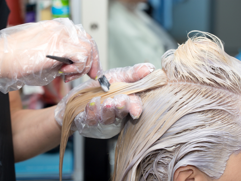 Image showing what causes a chemical cut with a woman getting her hair bleached