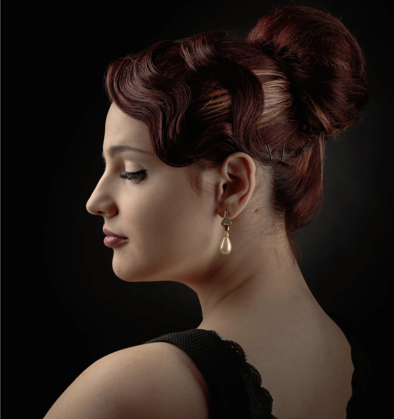 High Chignon With Finger Waved Bangs
