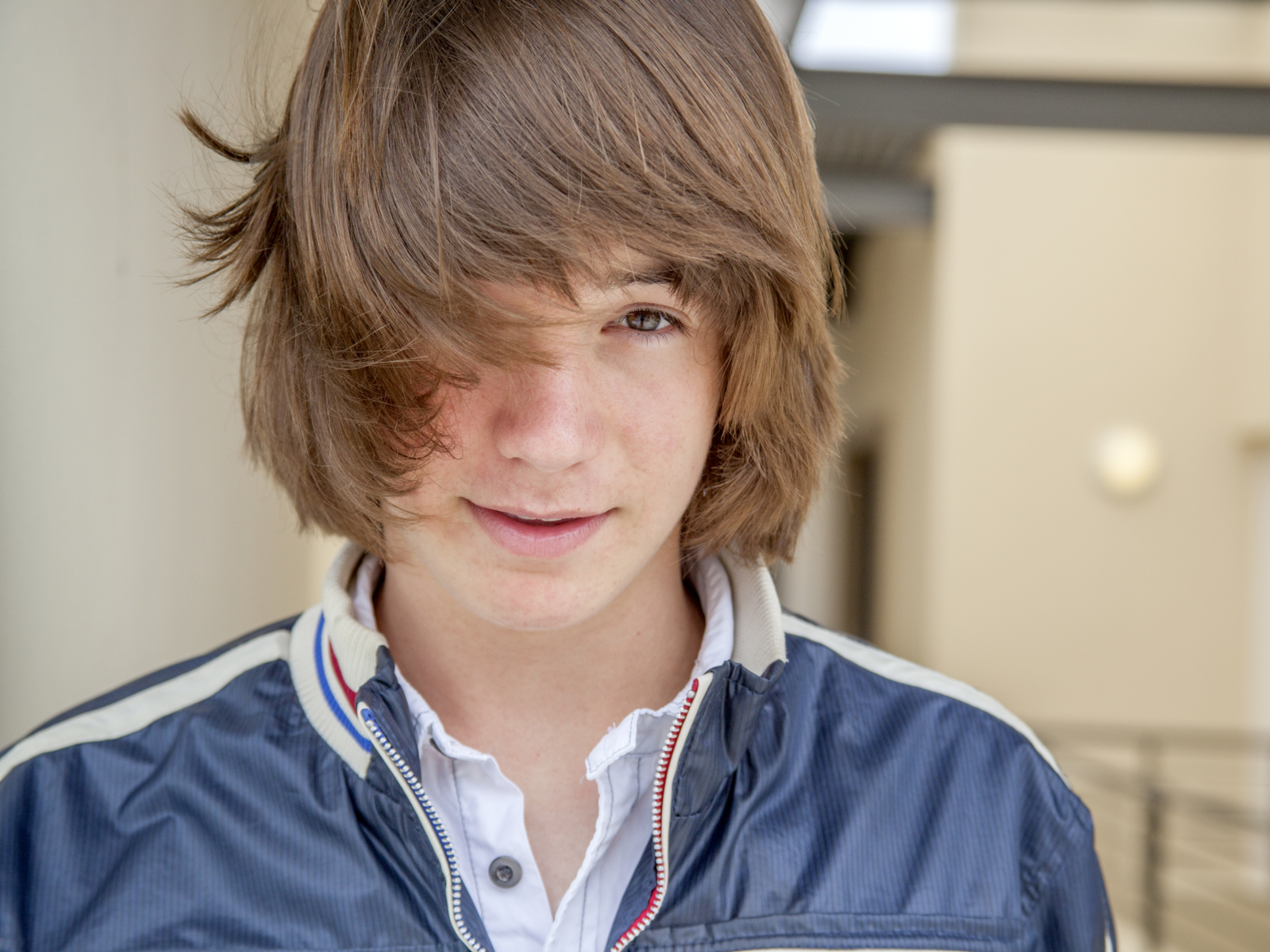 One of our favorite long hairstyles for boys titled the Skater Boy Razored Shag