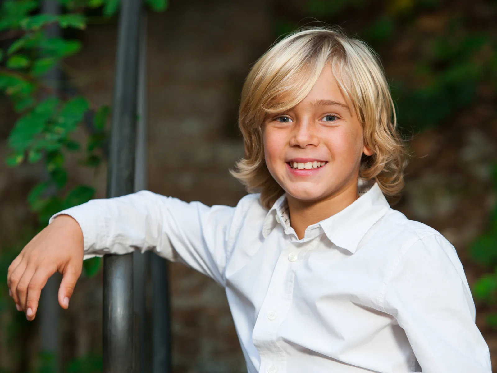 Clean-Cut Surfer Boy Shoulder Bob, a featured long hairstyle for boys