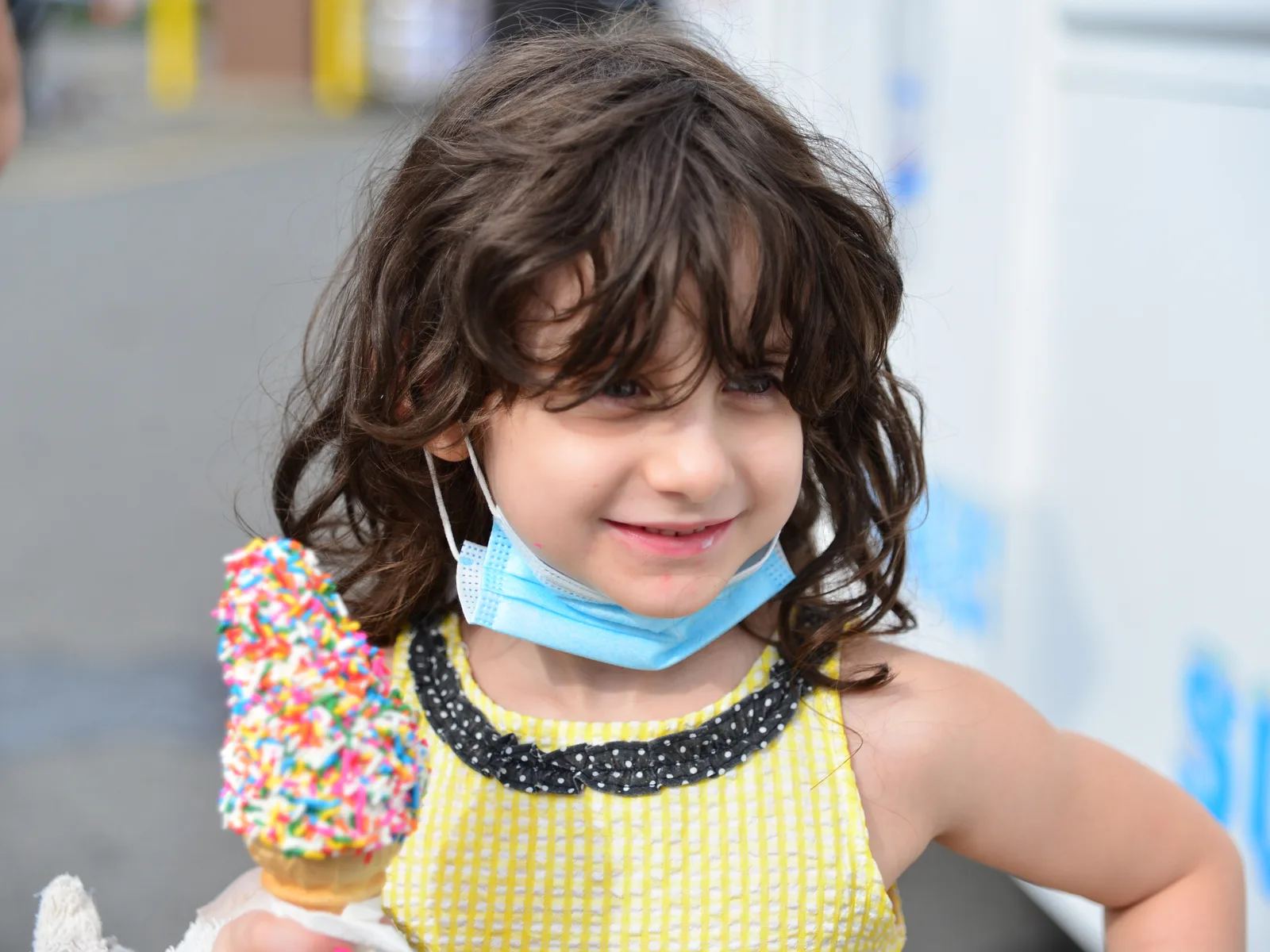 Girl with a Schoolhouse Messy Shaglet getting ice cream