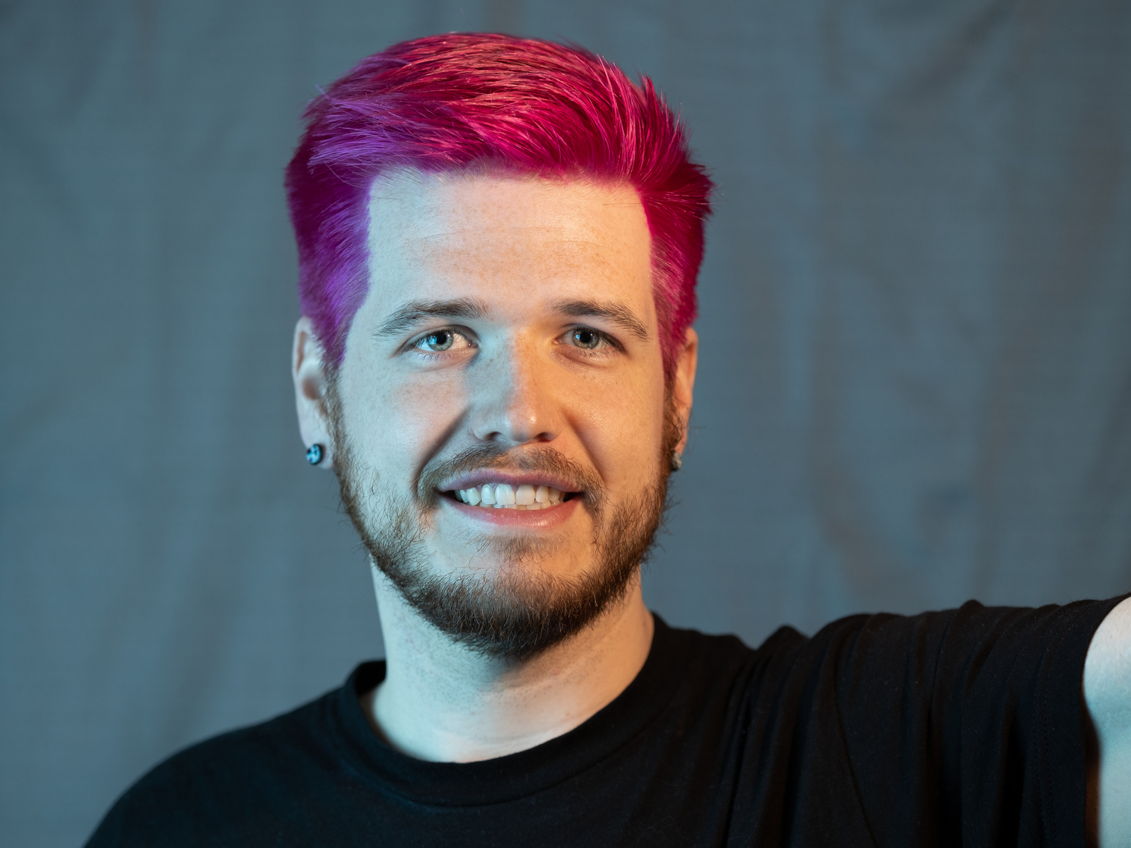 Bold and Bright Magenta hair color idea for men