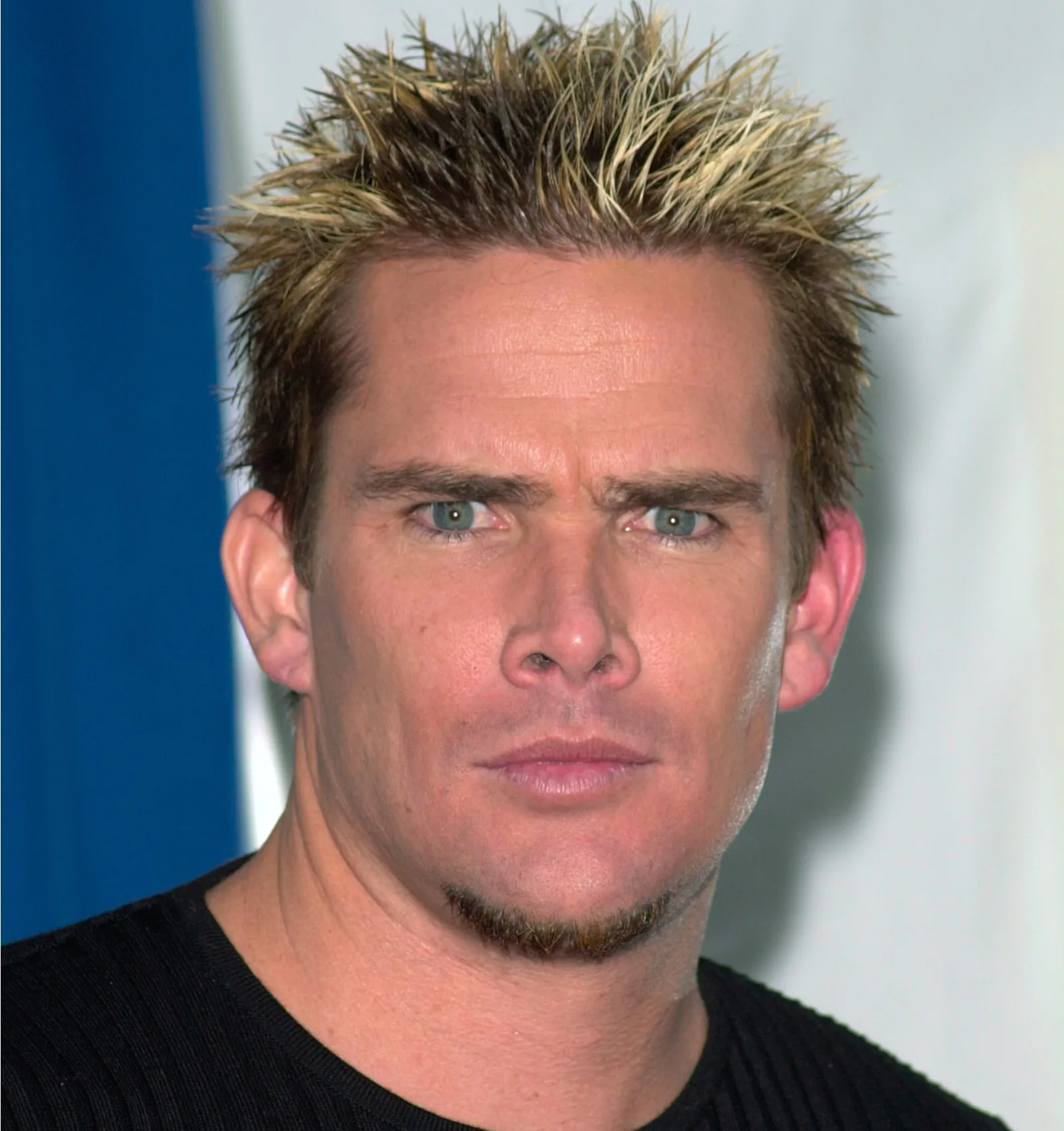 Photo of singer Mark Mcgrath at the Radio Music Awards rocking frosted tips hair