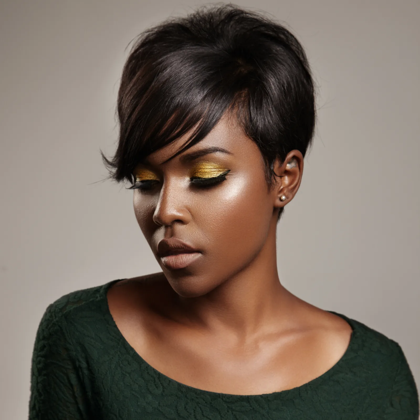 Relaxed Pixie With Side-Swept Bangs, a great short haircut for black women