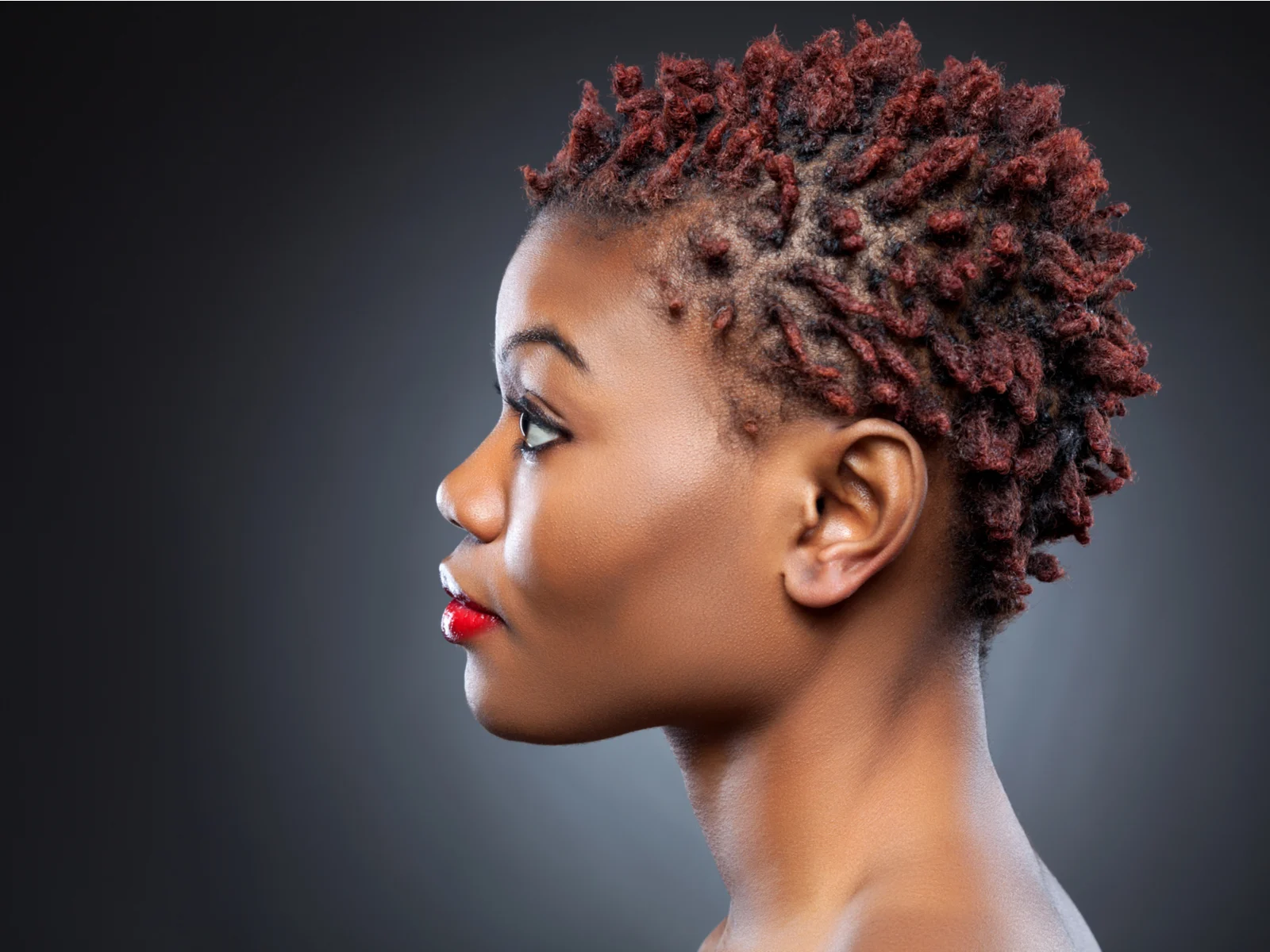 Cropped Red Baby Dreads as a featured short haircut for black women