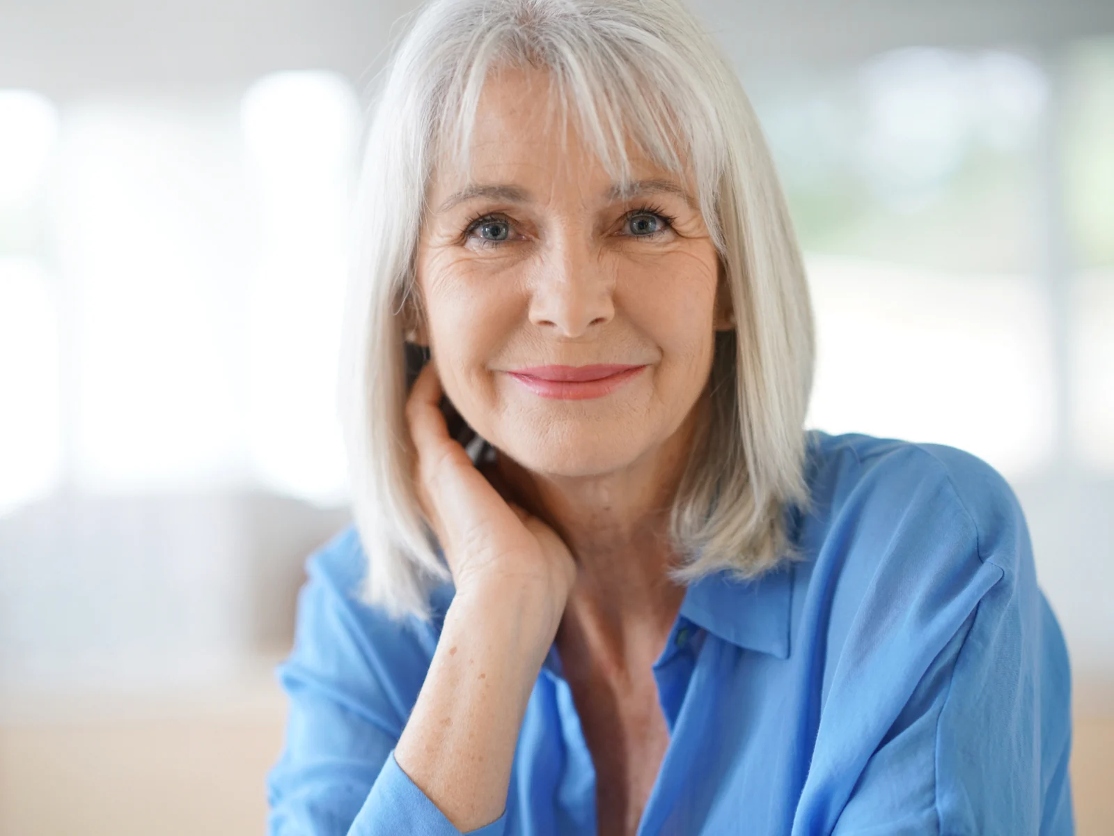 Medium Length With Open, Wispy Bangs for a piece on the best hairstyles for women over 70