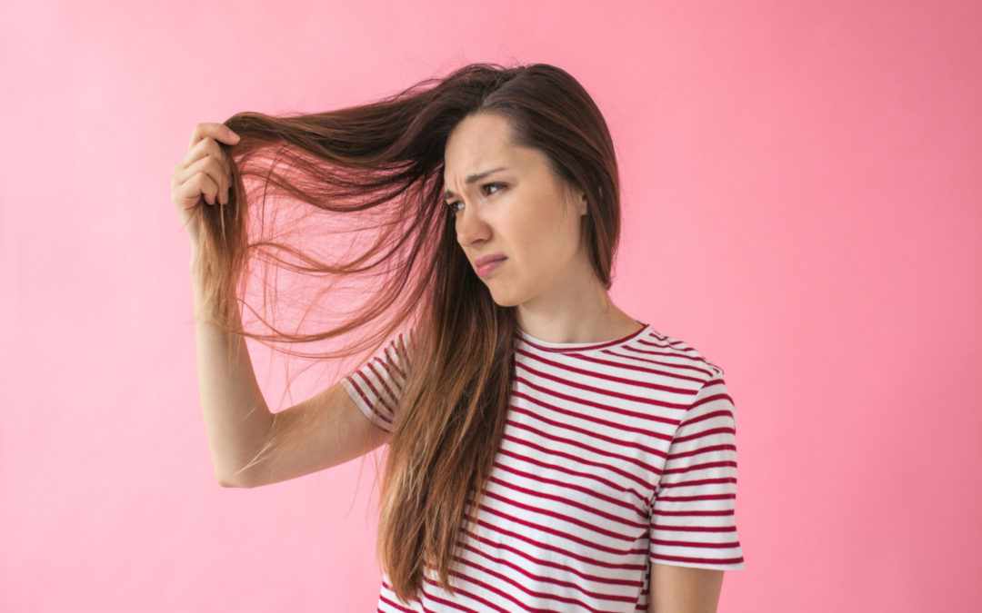 Why Does My Hair Feel Waxy? 4 Common Reasons