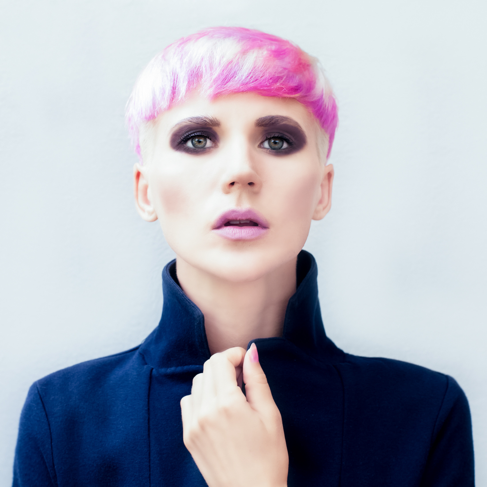 Side-Swept Pixie Fade With Blotchy Pink Color