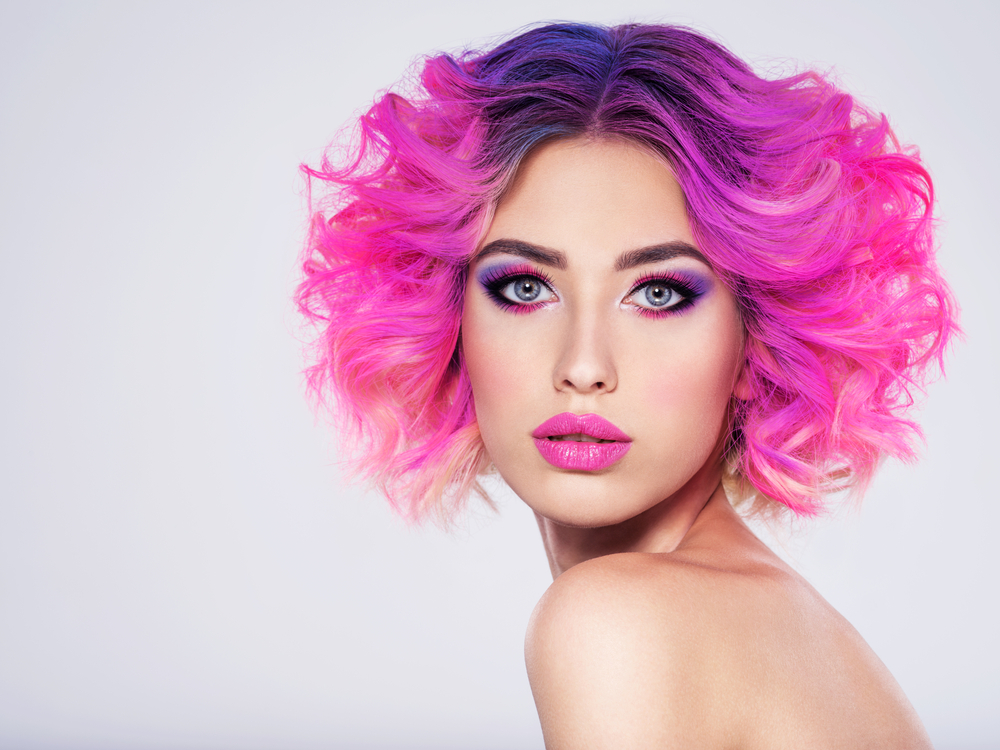 Neon Pink With Blue and Violet Roots unnatural hair color for blue eyes