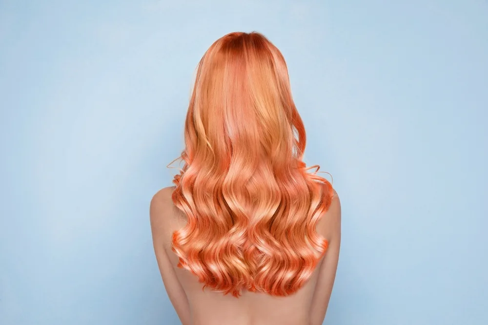Blonde Melon Long Curls orange hair color idea