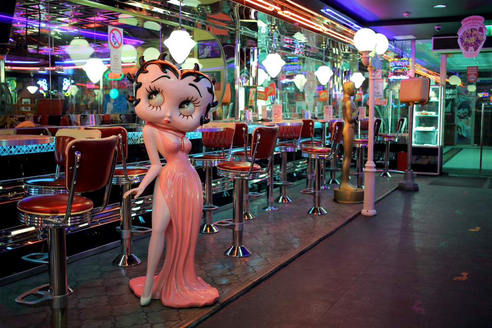 Statue of Betty Boop in a parlor for a piece on edges for Caucasian hair