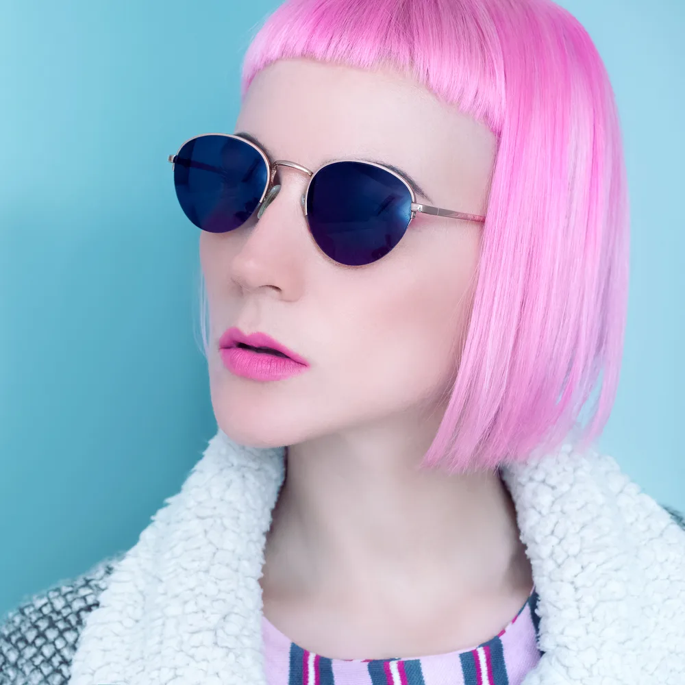 Featured alt hairstyle titled Pink Chin-Length Blunt Bob With Micro Bangs