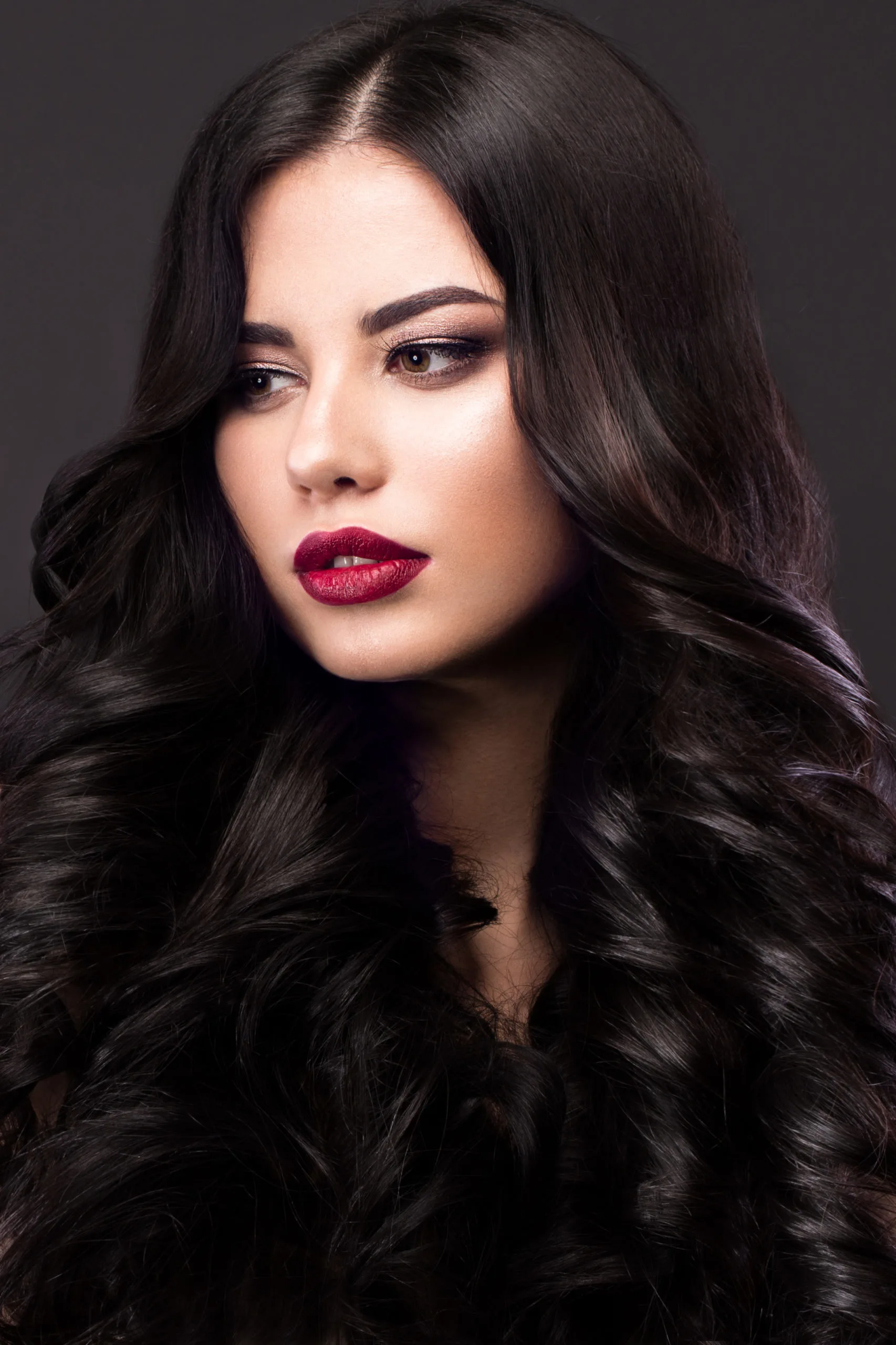 Violet Black winter hair color on a woman with pale skin in red lip