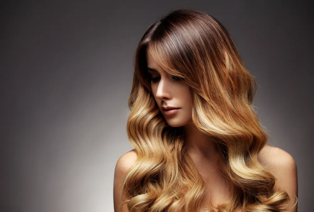 Chocolate Brown to Honey Blonde Bold Balayage, a top pick for the best color for olive skin