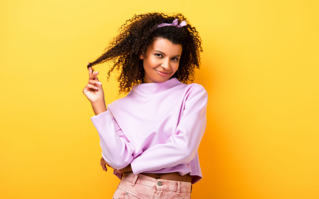 What Does It Mean When a Woman Plays With Her Hair?