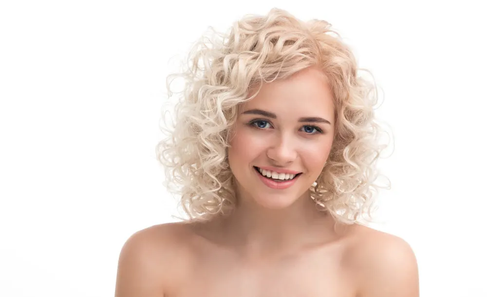 Light Blonde Spiral Perm for a piece on bleached permed hairstyles
