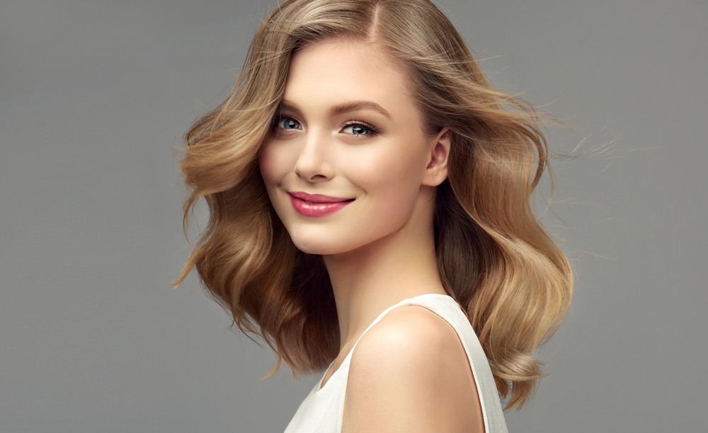 Shoulder Lob With Blended Face-Framing Layers, a featured medium-layered haircut