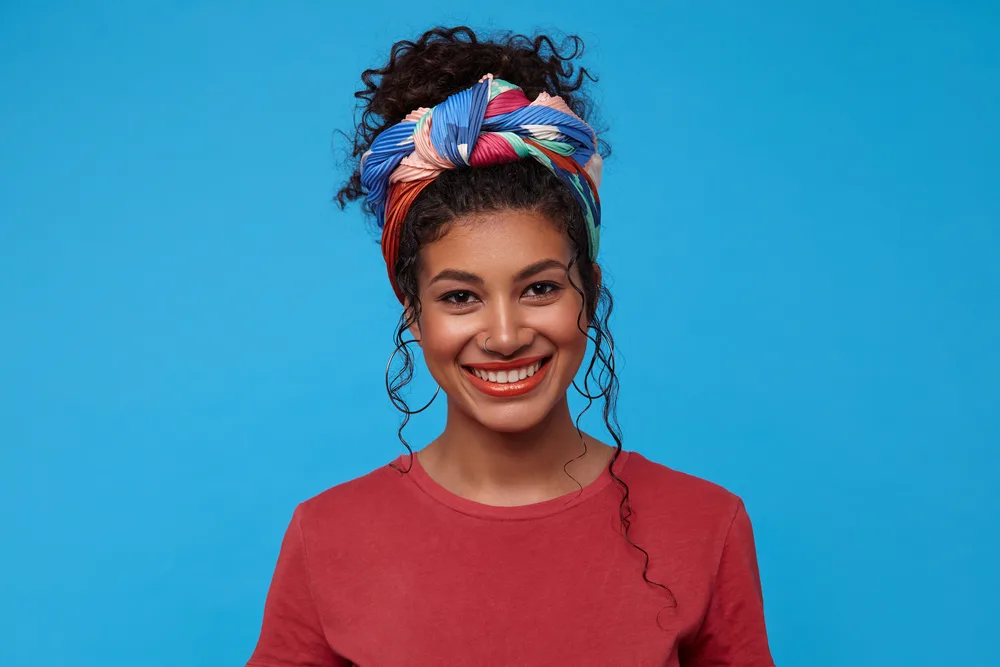 High Bun With Tied Scarf Headband and Face-Framing Pieces