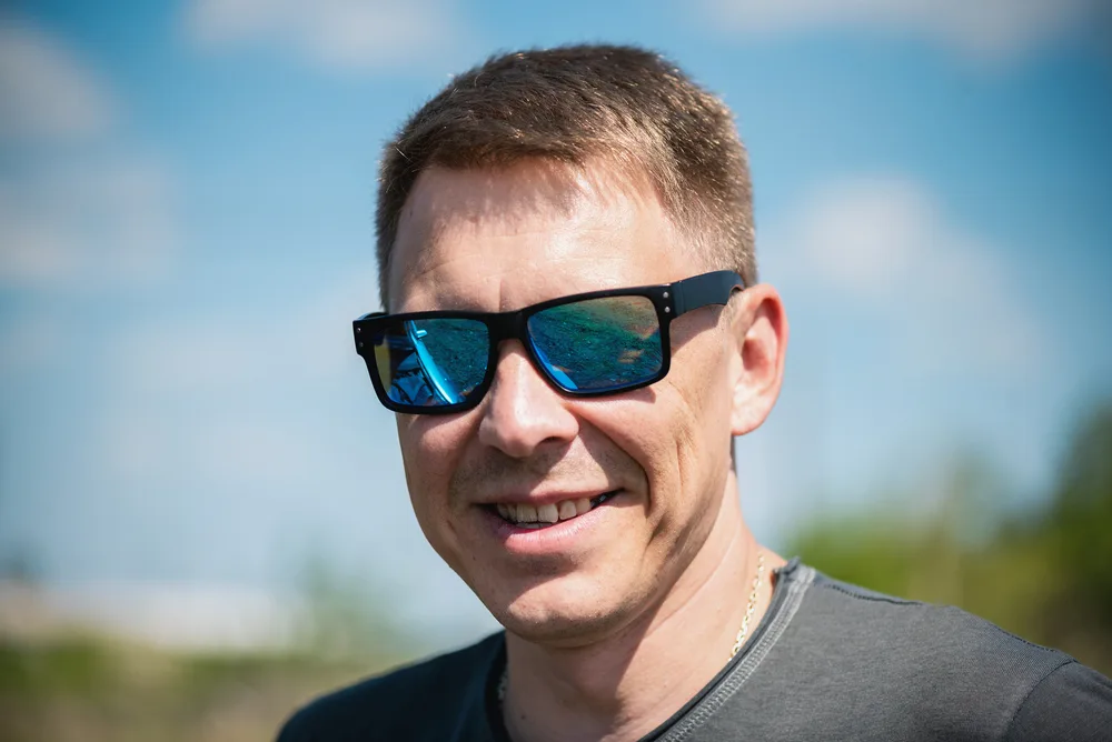 Classic American Crew Haircut on a guy in sunglasses