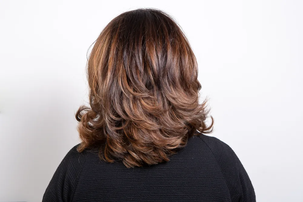 Thick Shoulder-Length Cut With Graduated Layers