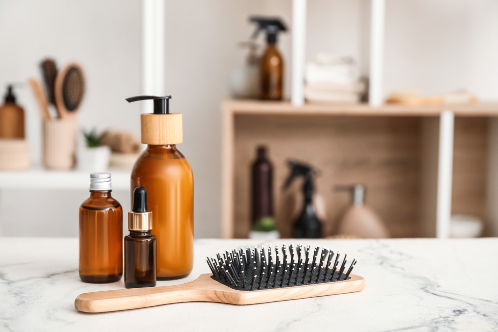 Various hair products that likely contain cetyl alcohol on a table