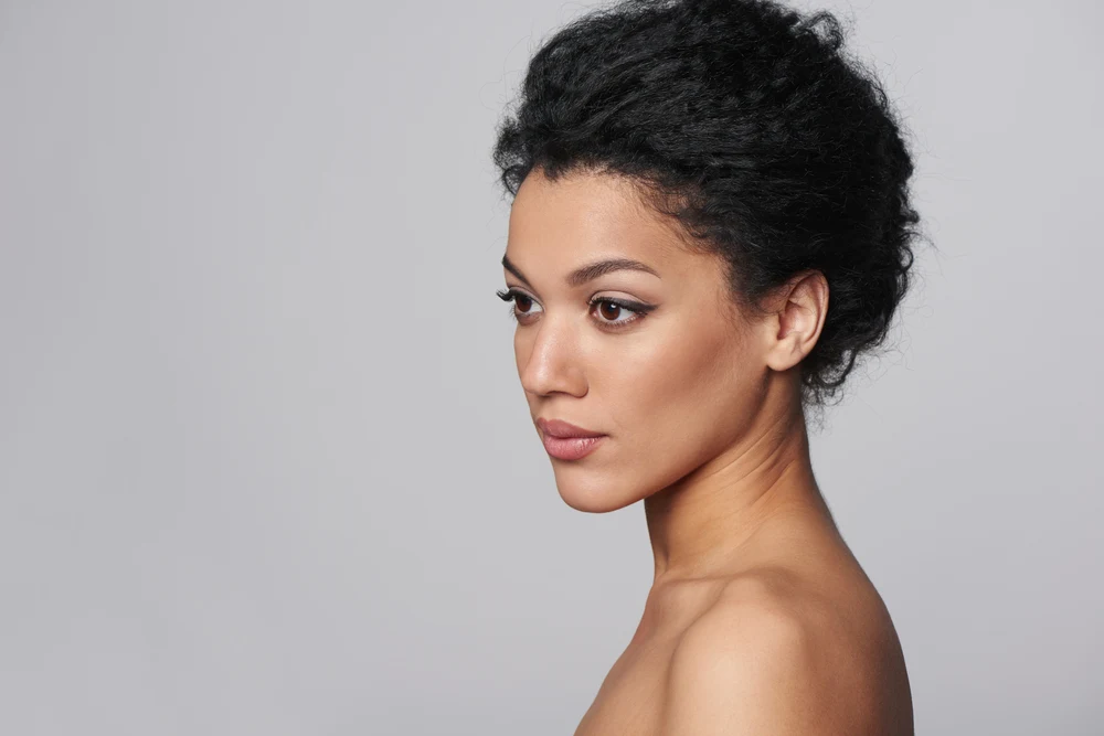 Chic French Twist With Boosted Volume mixed race cute hairstyle for curly hair