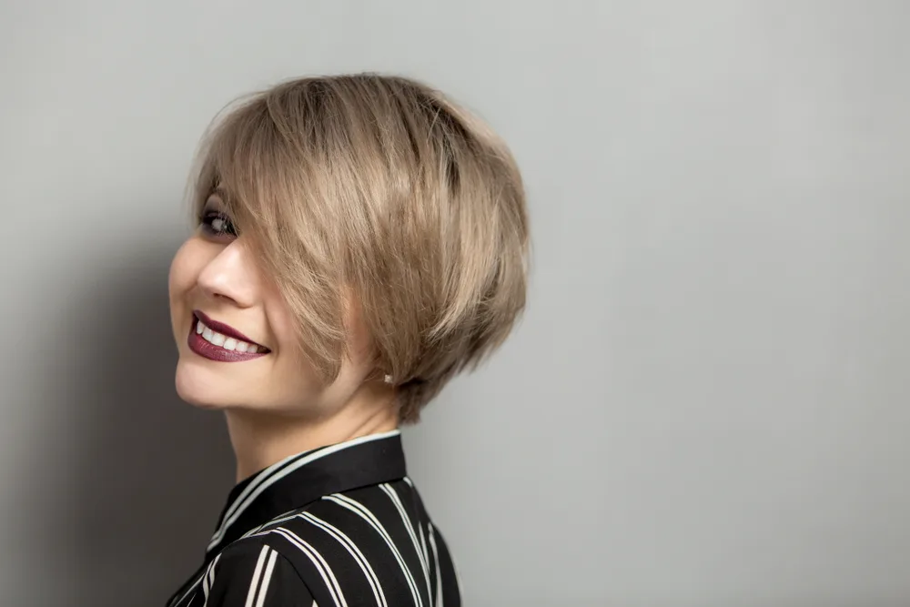 Side-Swept Pixie Bob With Crown Volume, a great short haircut for thick haired women