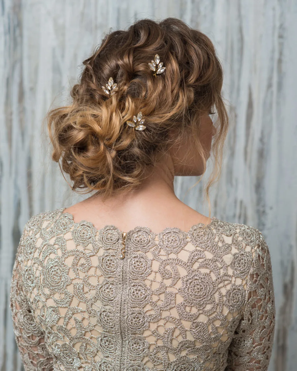 Low Textured Updo With Crystal Accents, a featured mother of the bride hairstyle