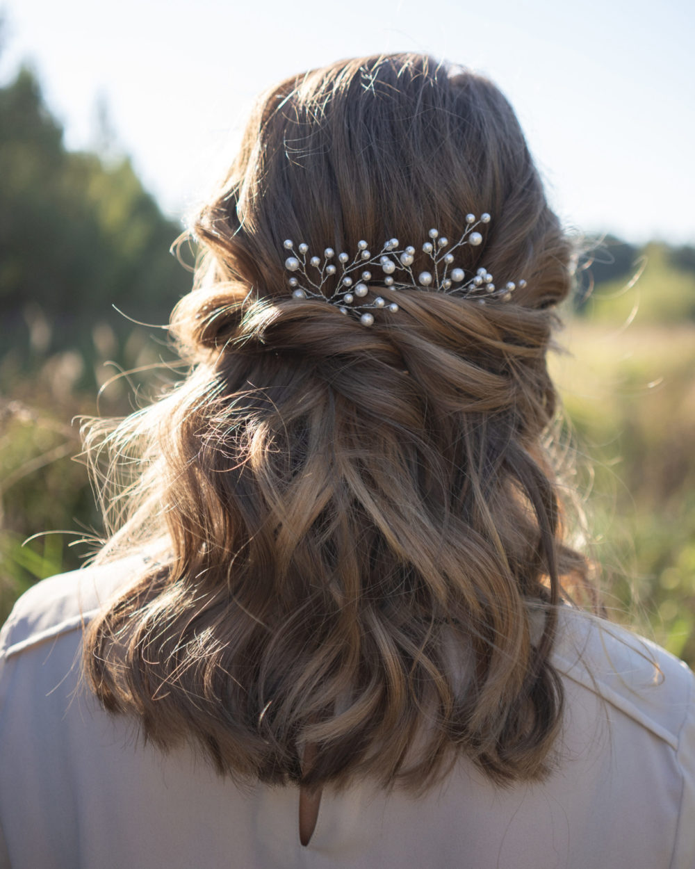 Loose Twisted Half-Up Waves With Pearl Combs, a great mother of the bride hairstyle