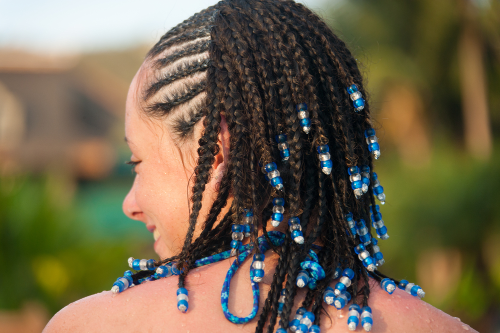 Flat and Hanging Braids With Blue and White Bead Caps