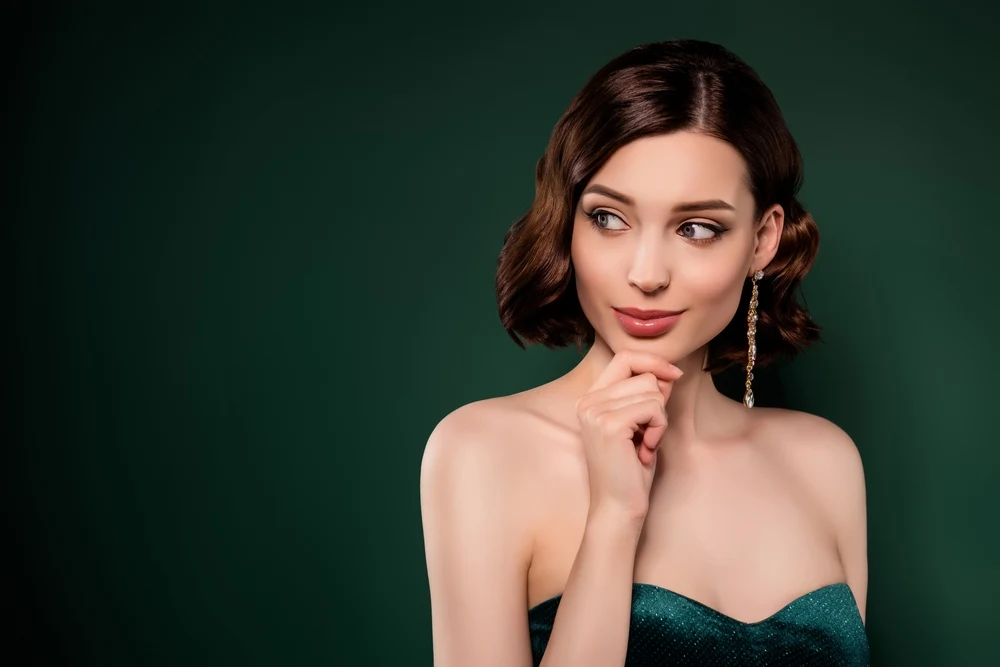 Vintage Side-Tucked Short Curls as a featured prom hairstyle