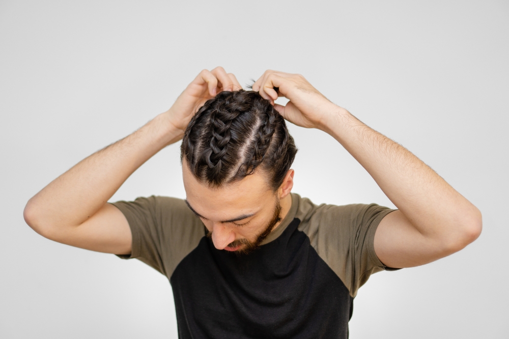 Featured hairstyle for braided hairstyles for white men featuring a Basic Dutch Braids With Varied Width
