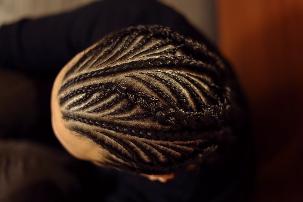 Intersecting Straight Back and Curvy Cornrows