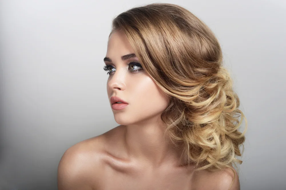 Draped Side Updo With Hanging Curls, a great hairstyle for prom