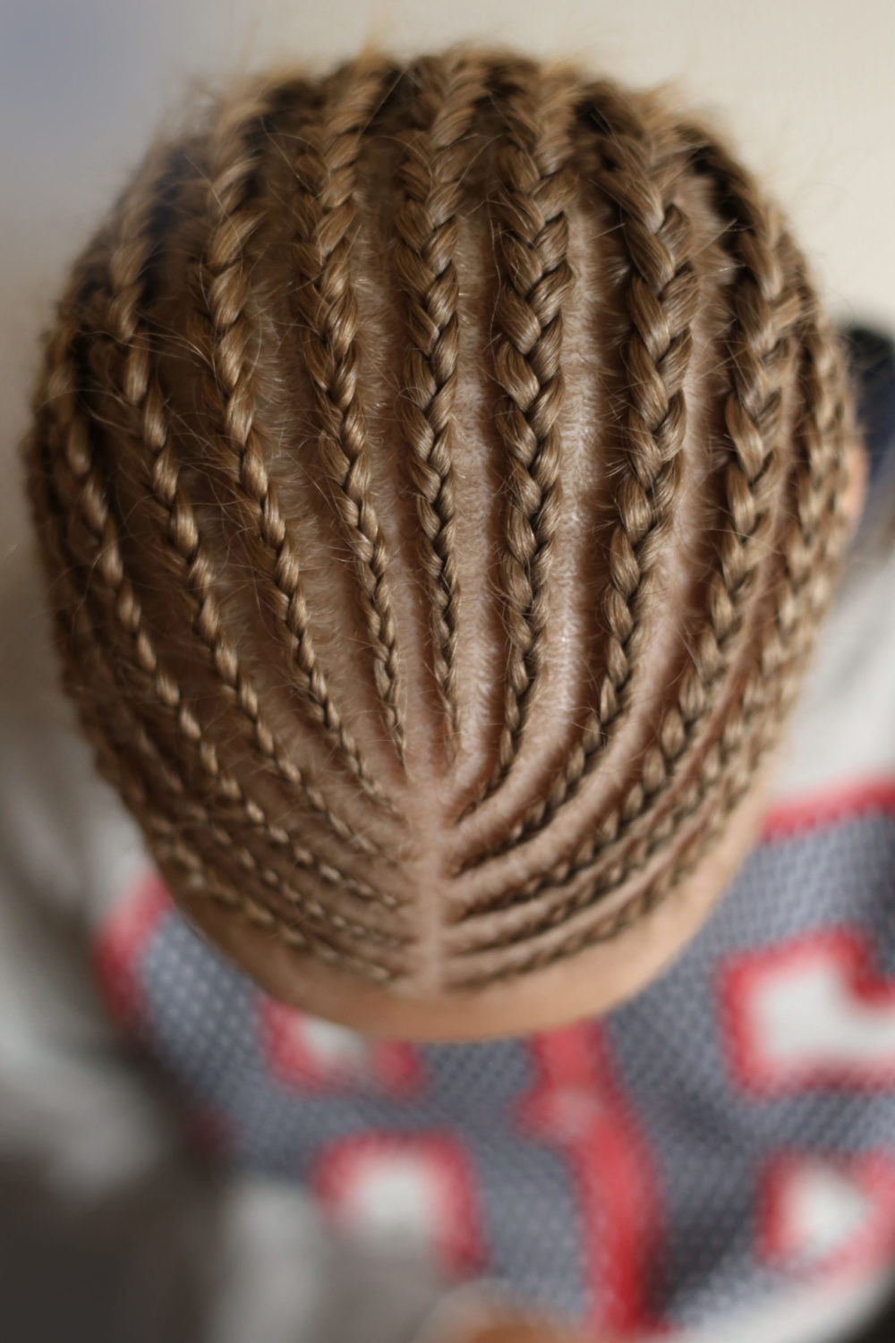 Curved Split Front Flat Braids, one of the best white men's braided hairstyles