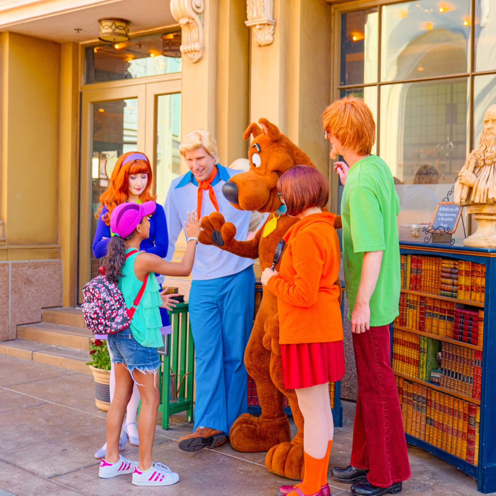 Group dressed up as Scooby Doo characters including Fred as one of the best Halloween costumes for blondes