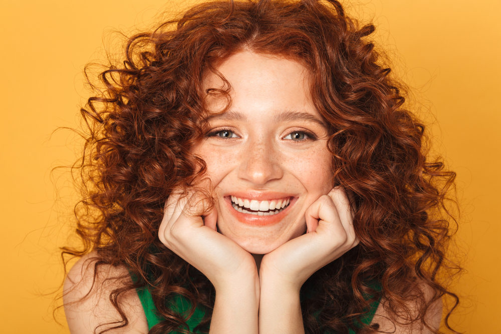 Glowing Medium Auburn, one of the best hair colors for curly hair