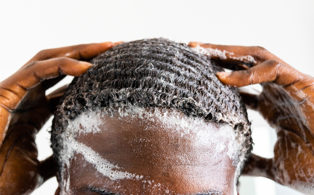 Man using some of the best products for waves on his head