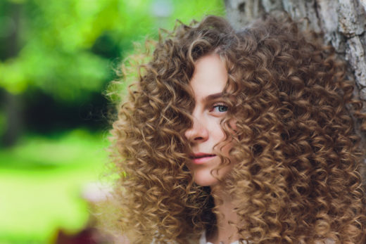 The 20 Best Hair Colors for Curly Hair in 2024