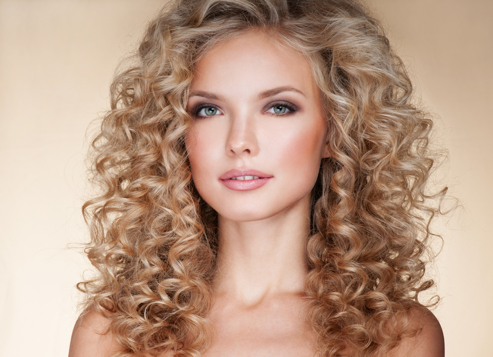 Light Golden Blonde to Strawberry Blonde Ombre, one of the best hair colors for curly hair