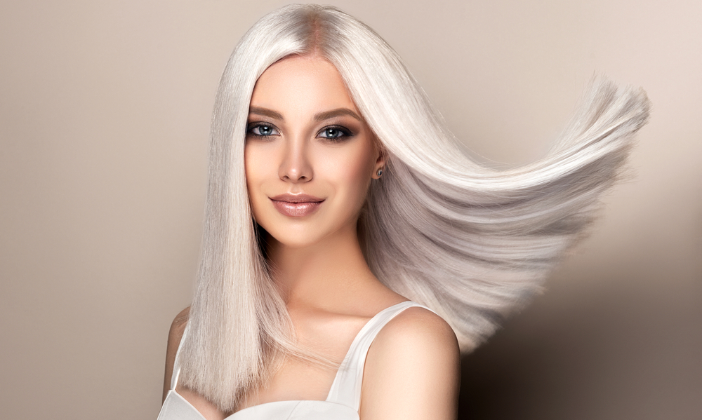 A top pick for the best hair colors for tan skin, Cool Platinum Blonde
