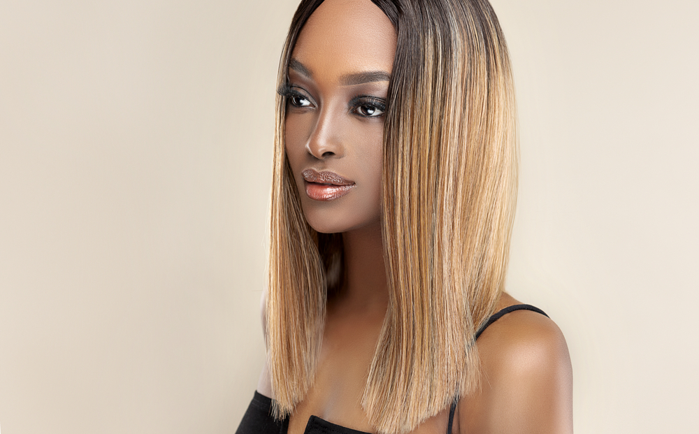 Cool Brown With Warm Honey Balayage for a piece on the best hair color for dark skin